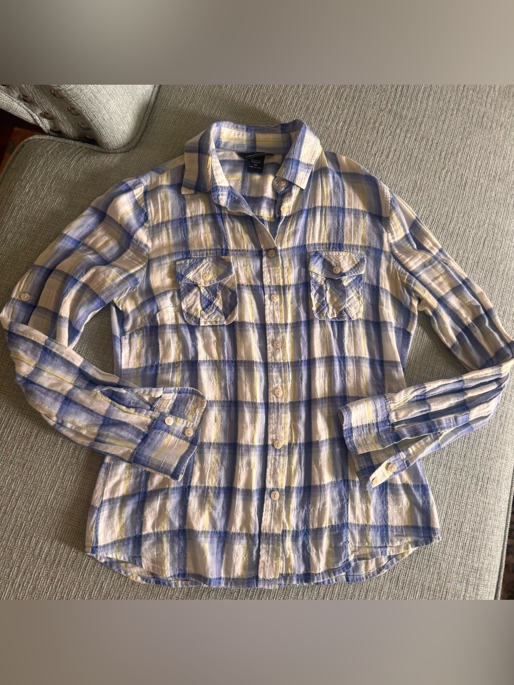 Blue, white and yellow checked slightly seersucker shirt